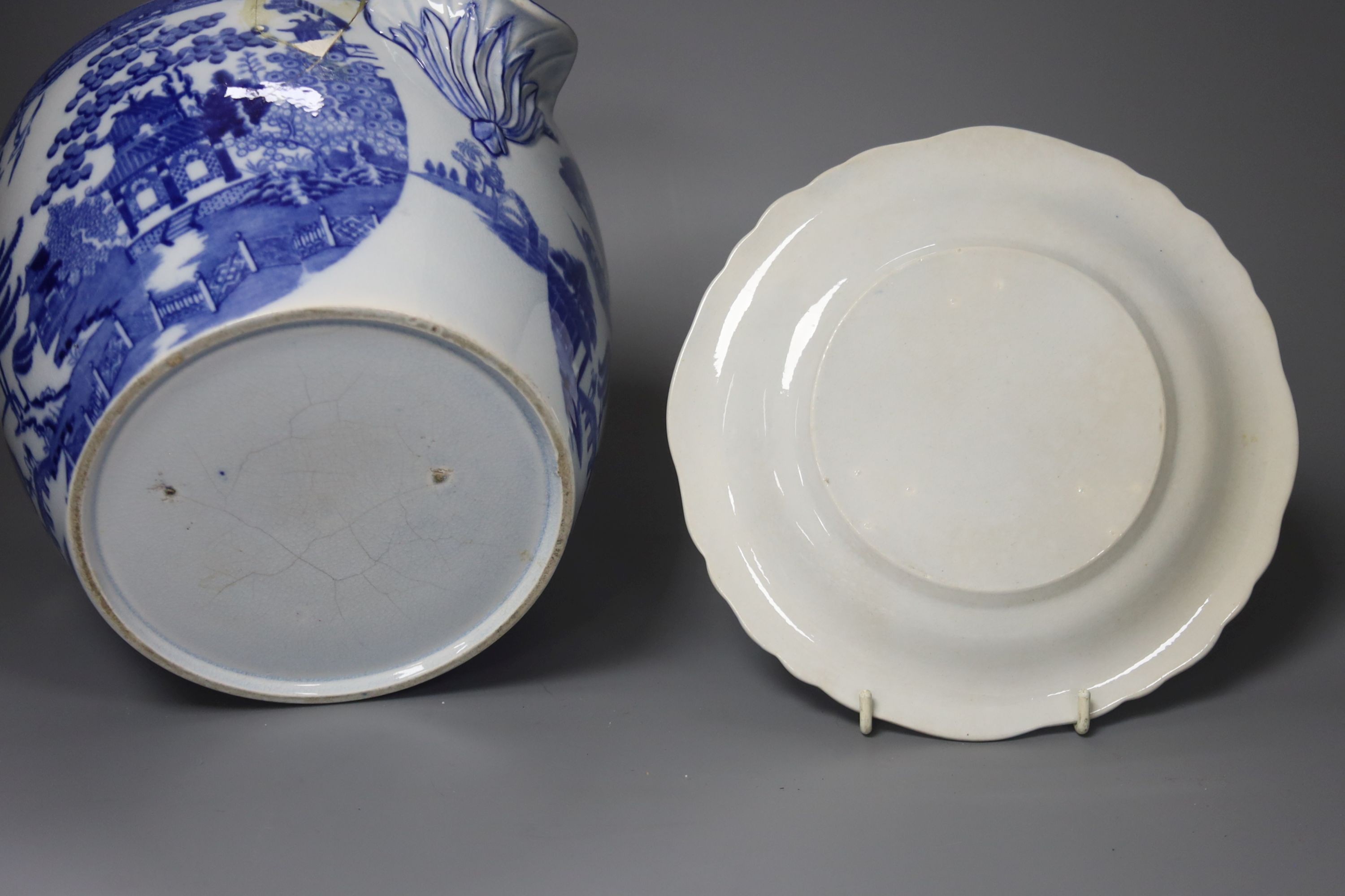 A Victorian blue-printed earthenware wine cooler (a.f.) 18cm high and a Victorian pearlware plate